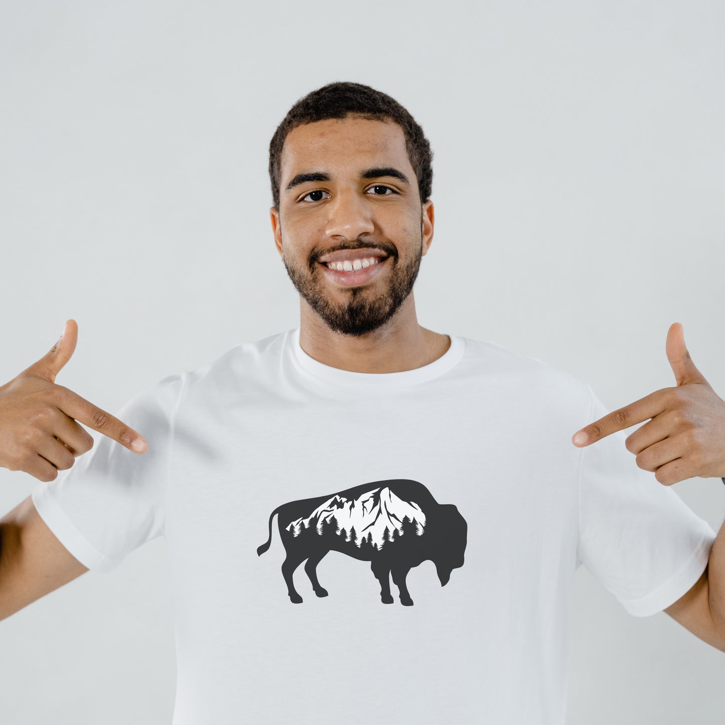 Majestic bison silhouette with mountain landscape for crafting