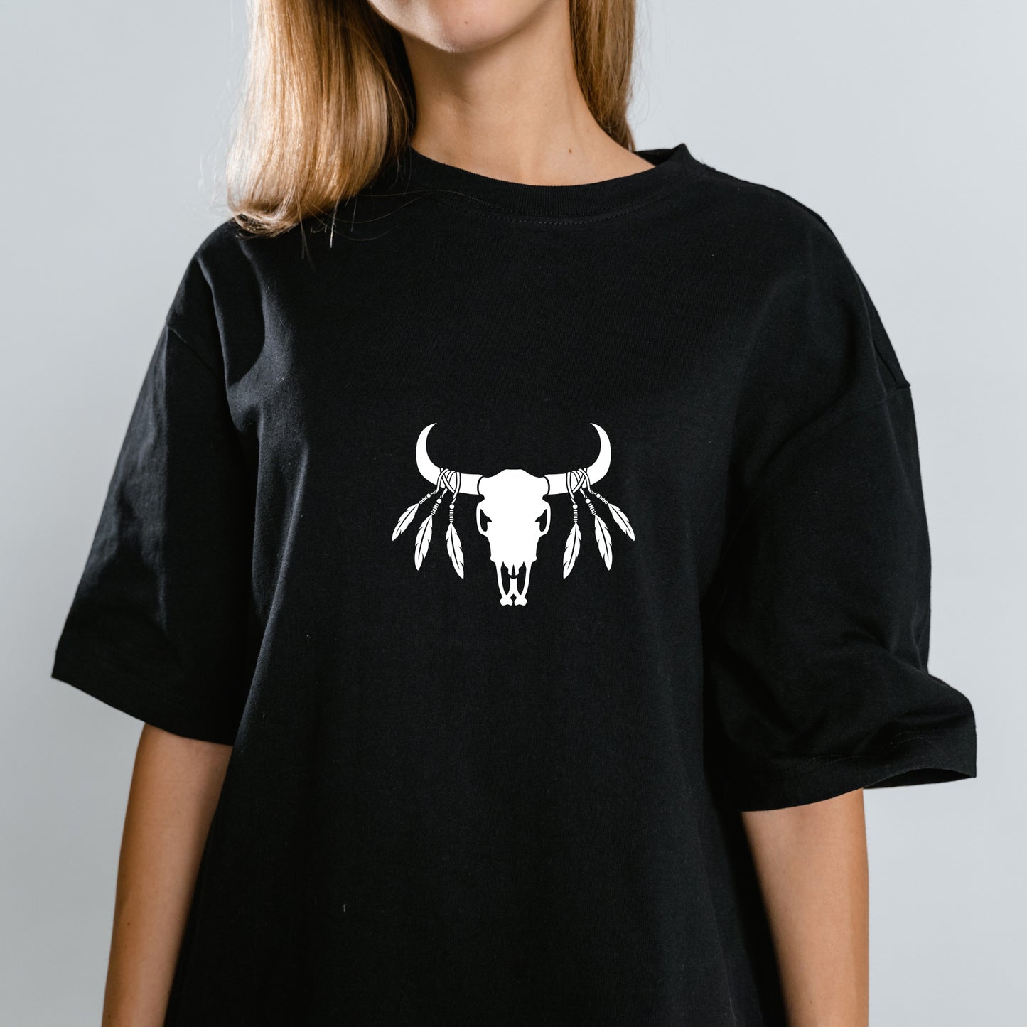 Intricate bull skull design with feathers for crafting