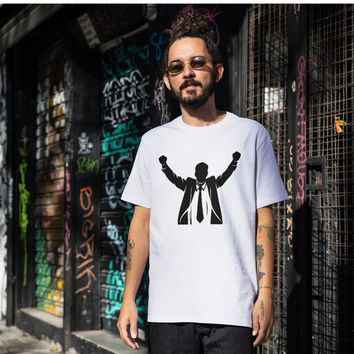 Businessman celebrates success with arms raised in triumph