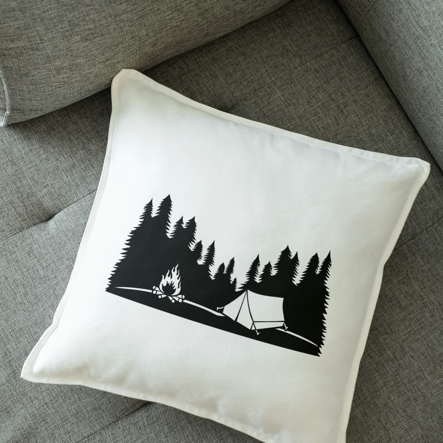 Camping in the wilderness with tent and roaring fire