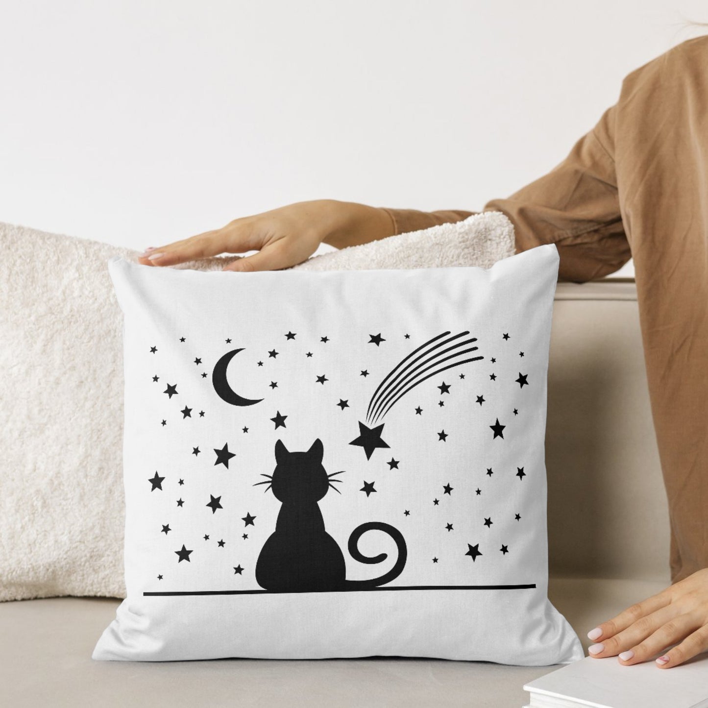 Whimsical cat gazing at the starry night sky in silhouette