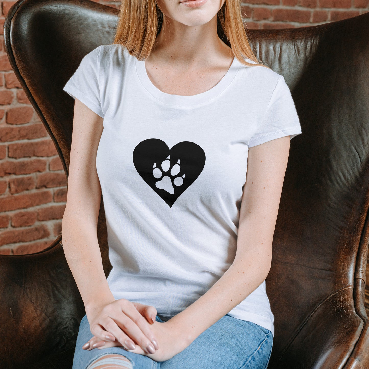 Cat paw print enclosed in a heart shape for cutting designs