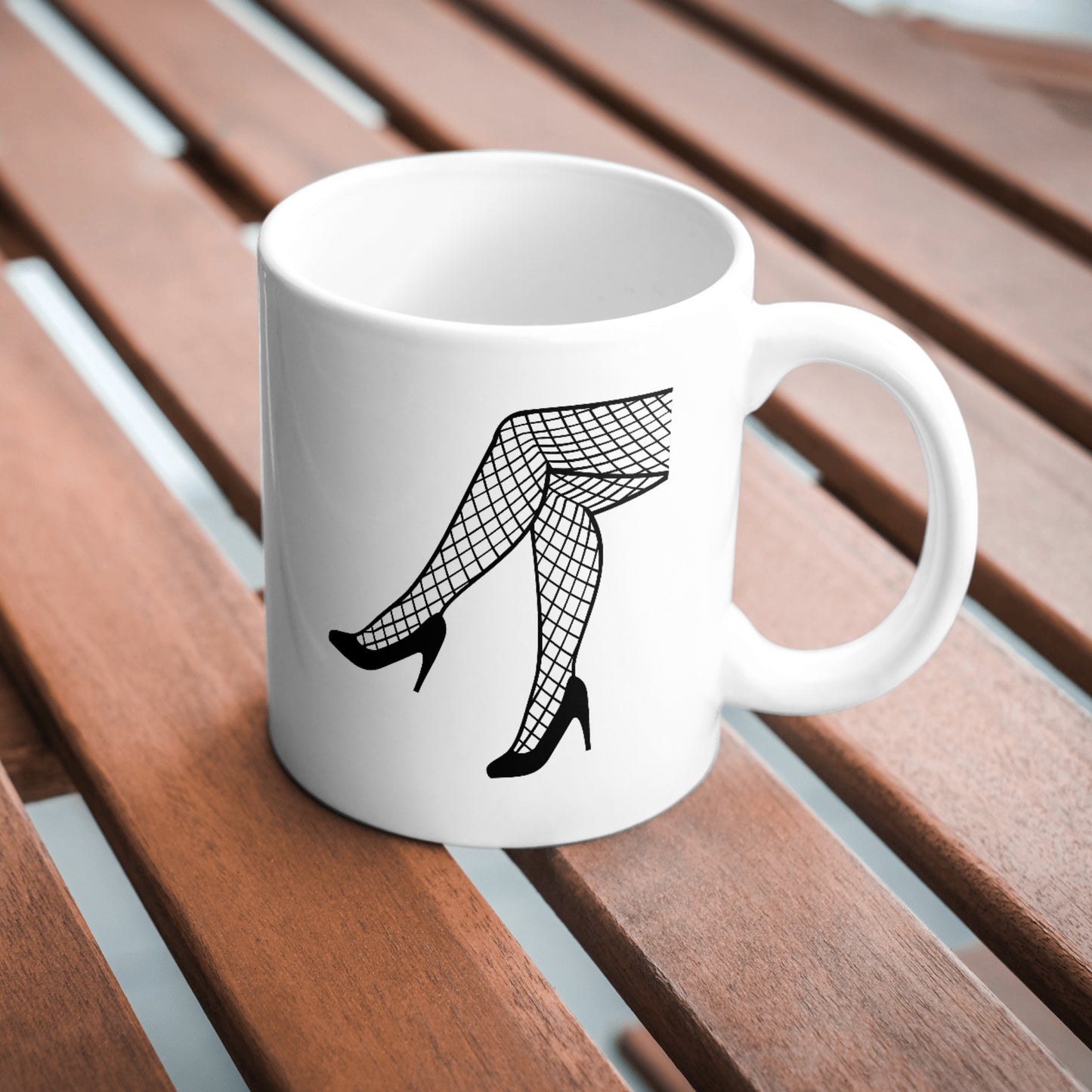Stylish crossed legs in fishnet stockings for creative projects
