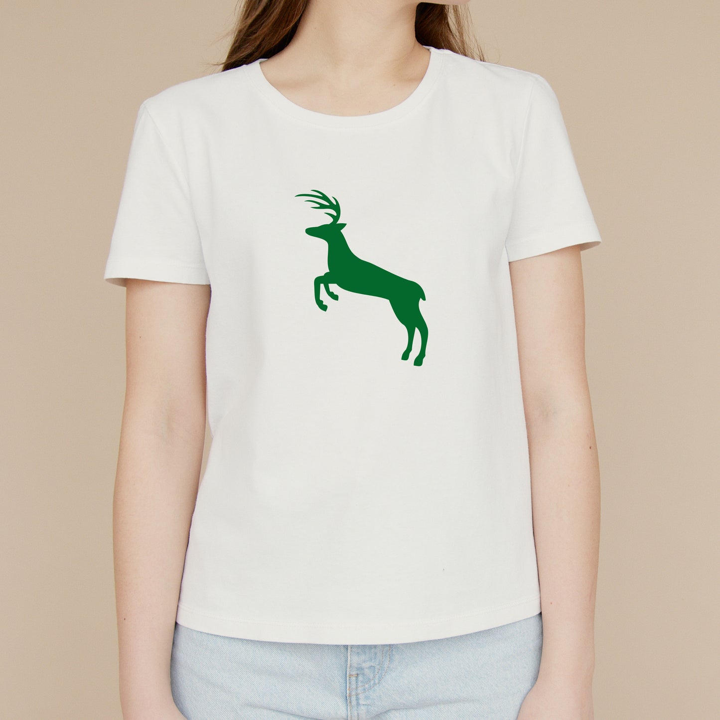 Elegant deer leaps gracefully in a forest backdrop