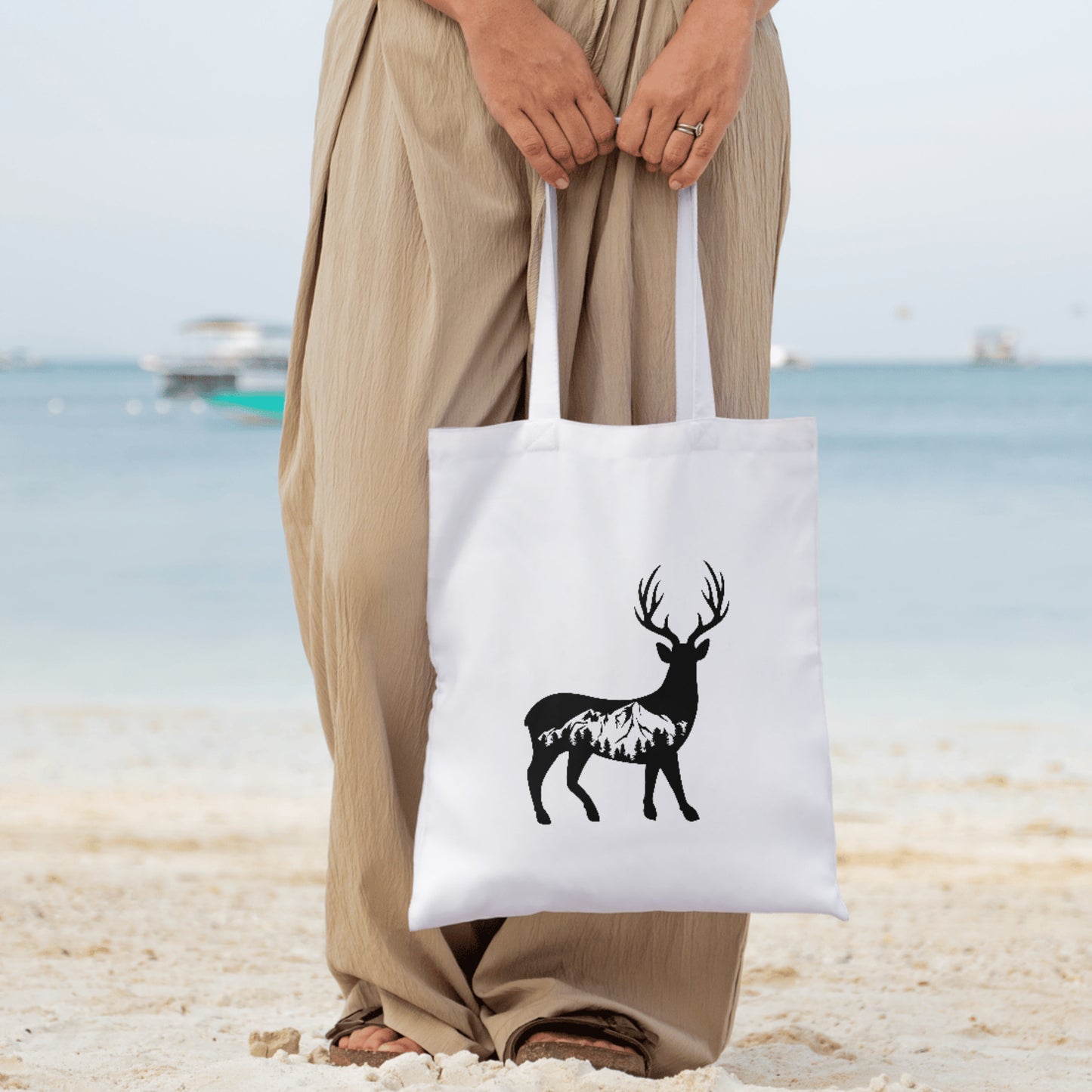 Majestic deer silhouette with mountain landscape design