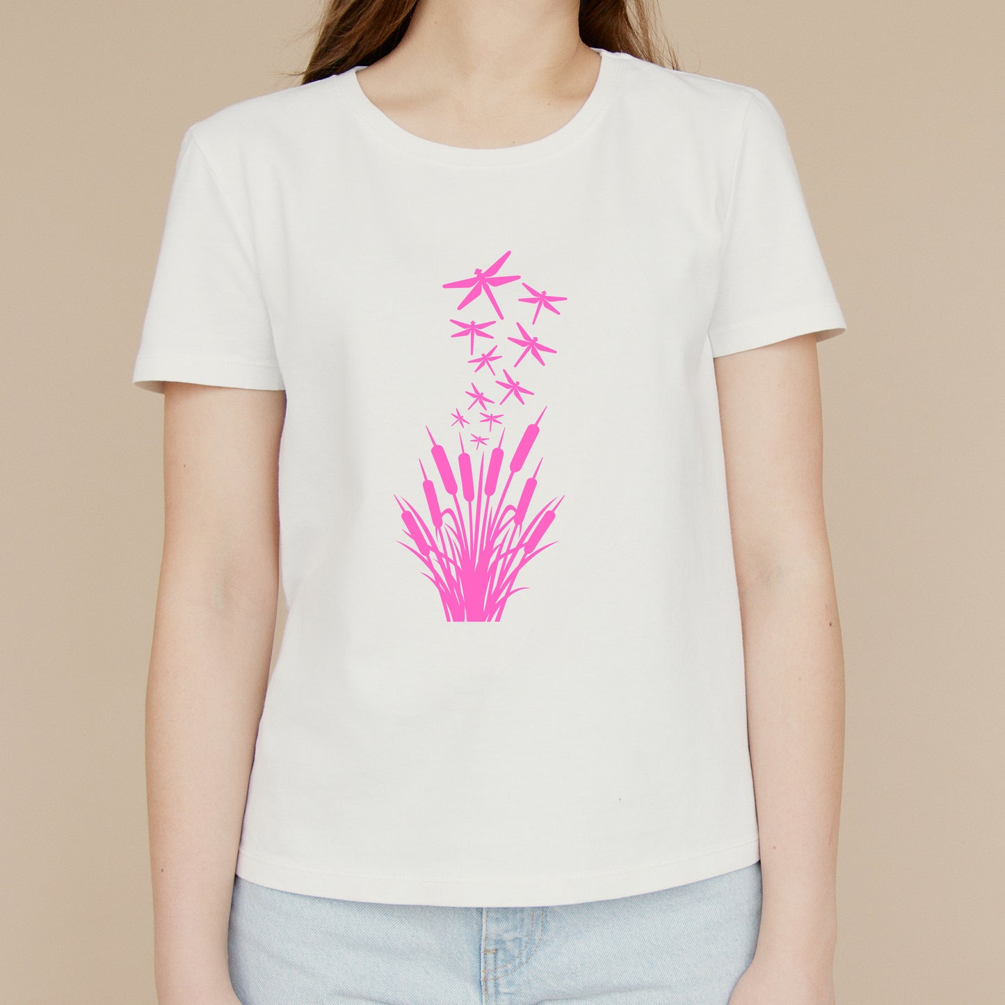 Dragonflies dance above serene reeds in tranquil harmony