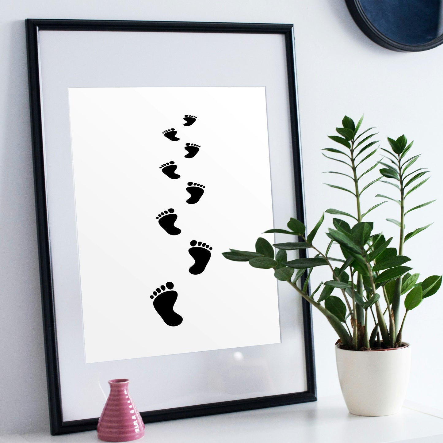 Unique footprints in the sandy shore for creative projects