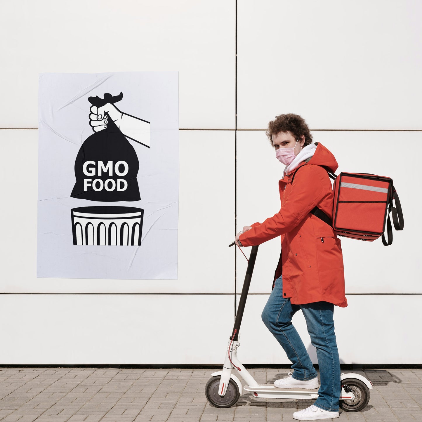 Hand gripping bag of GMO food ready for disposal