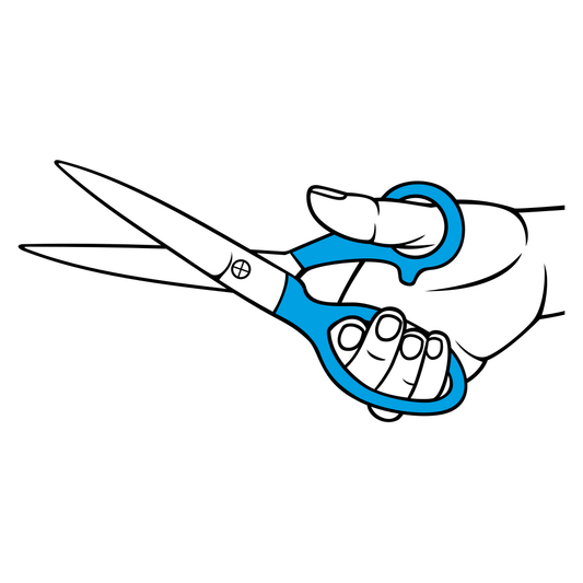 Creative hand holding scissors for crafting and design work
