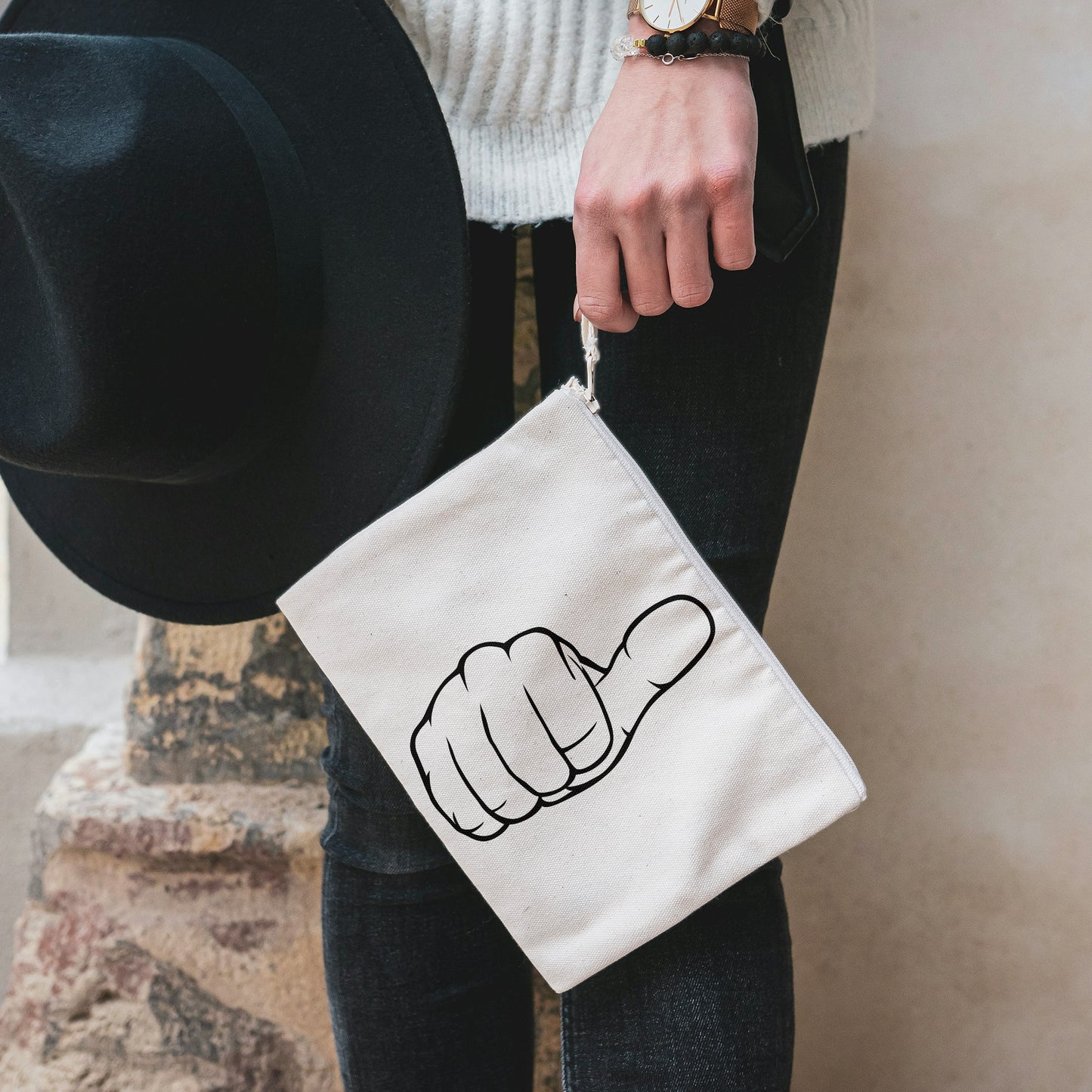 Human hand giving thumbs up for creative projects