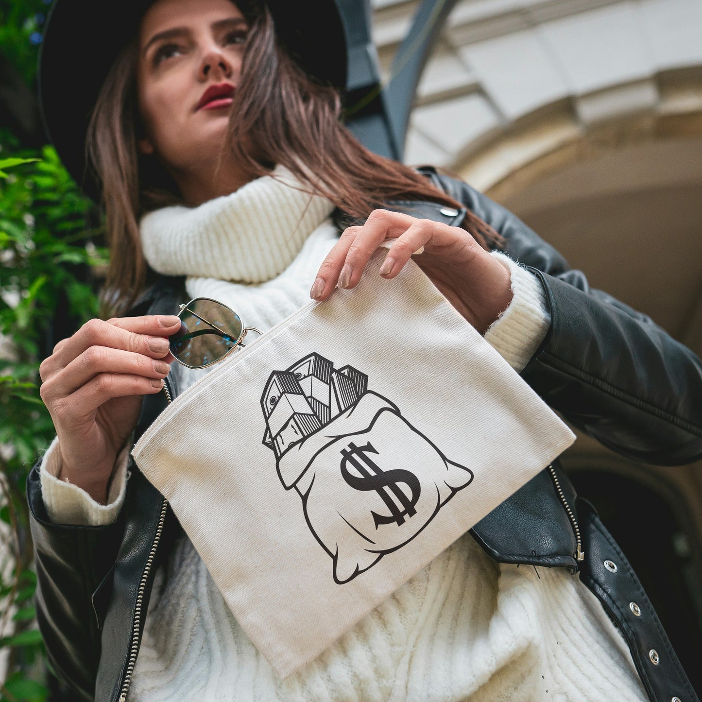 Creative black and white vector design of a money bag