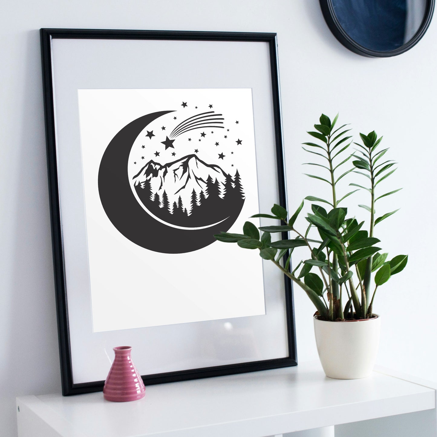 Moonlit mountain landscape with stars and comet design