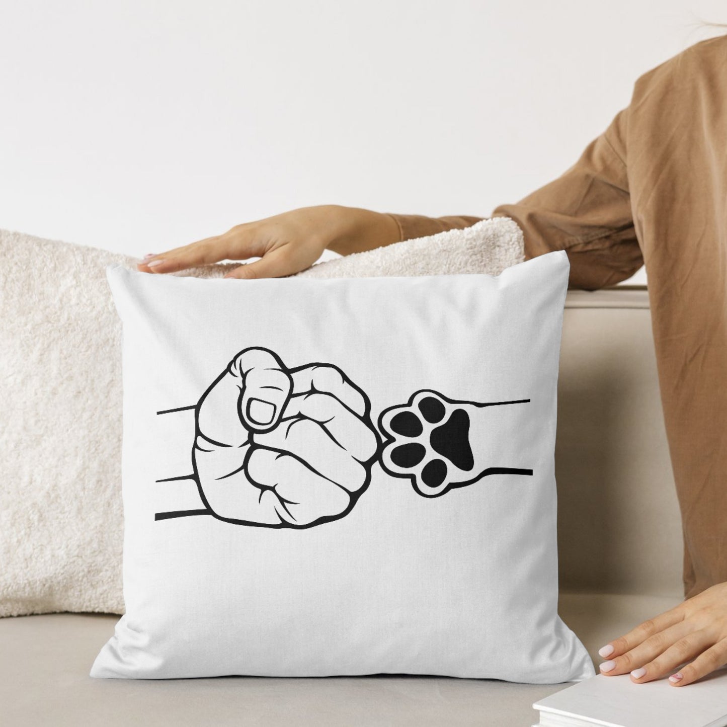 Fist bump between human hand and paw design for cutting machine