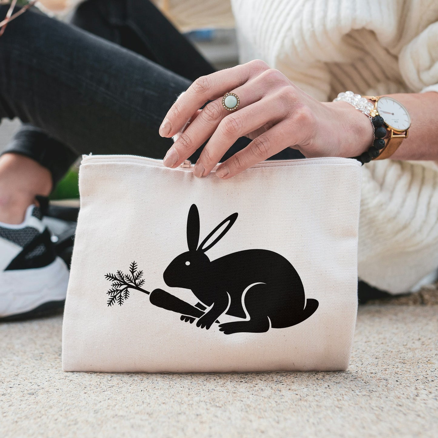 Charming rabbit happily holding a carrot for creative projects