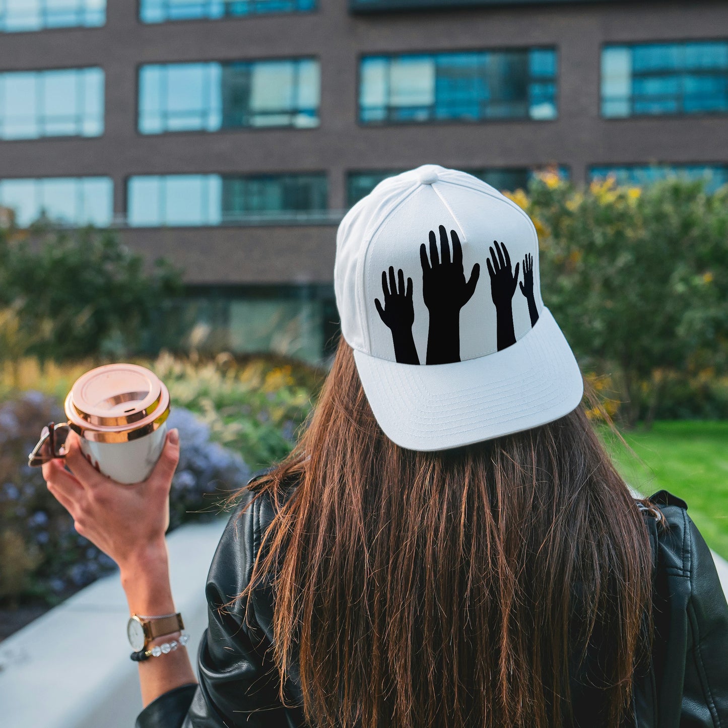 Celebrating unity with raised hands in creative design