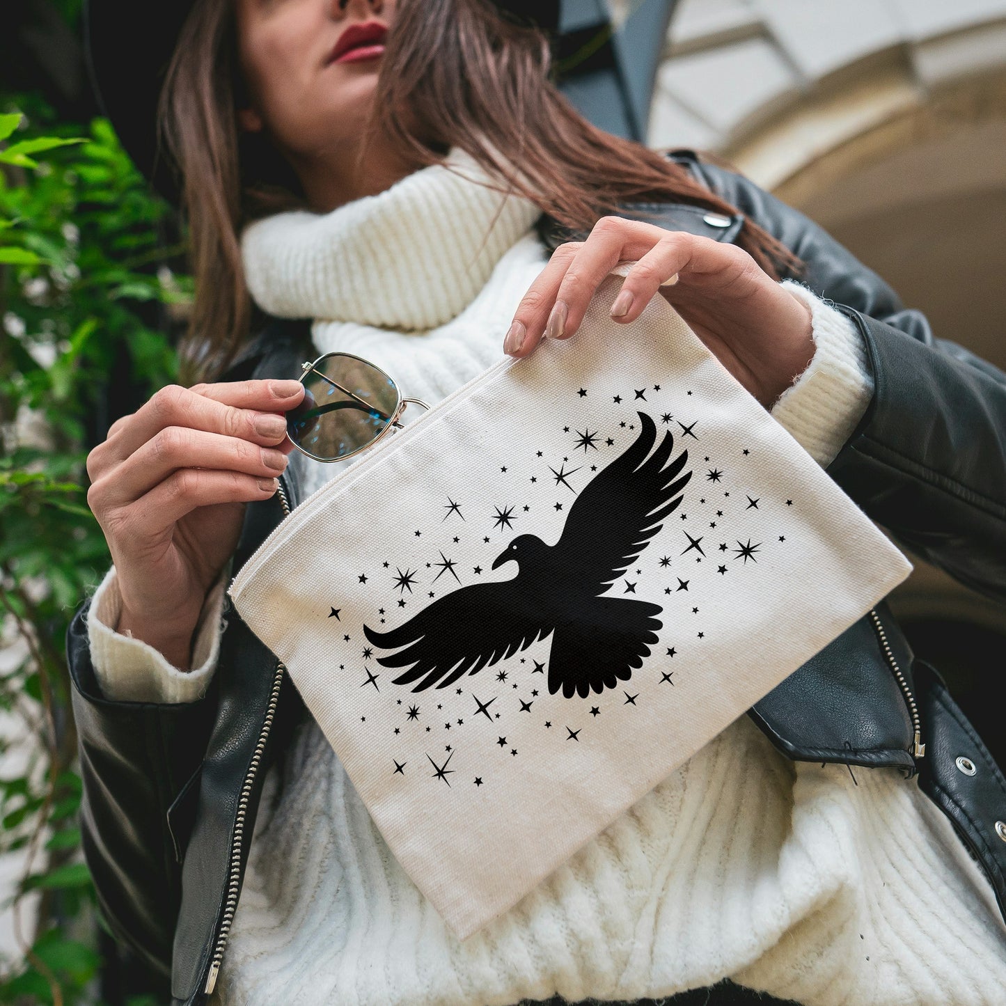 Majestic black eagle soaring among twinkling stars in vector art