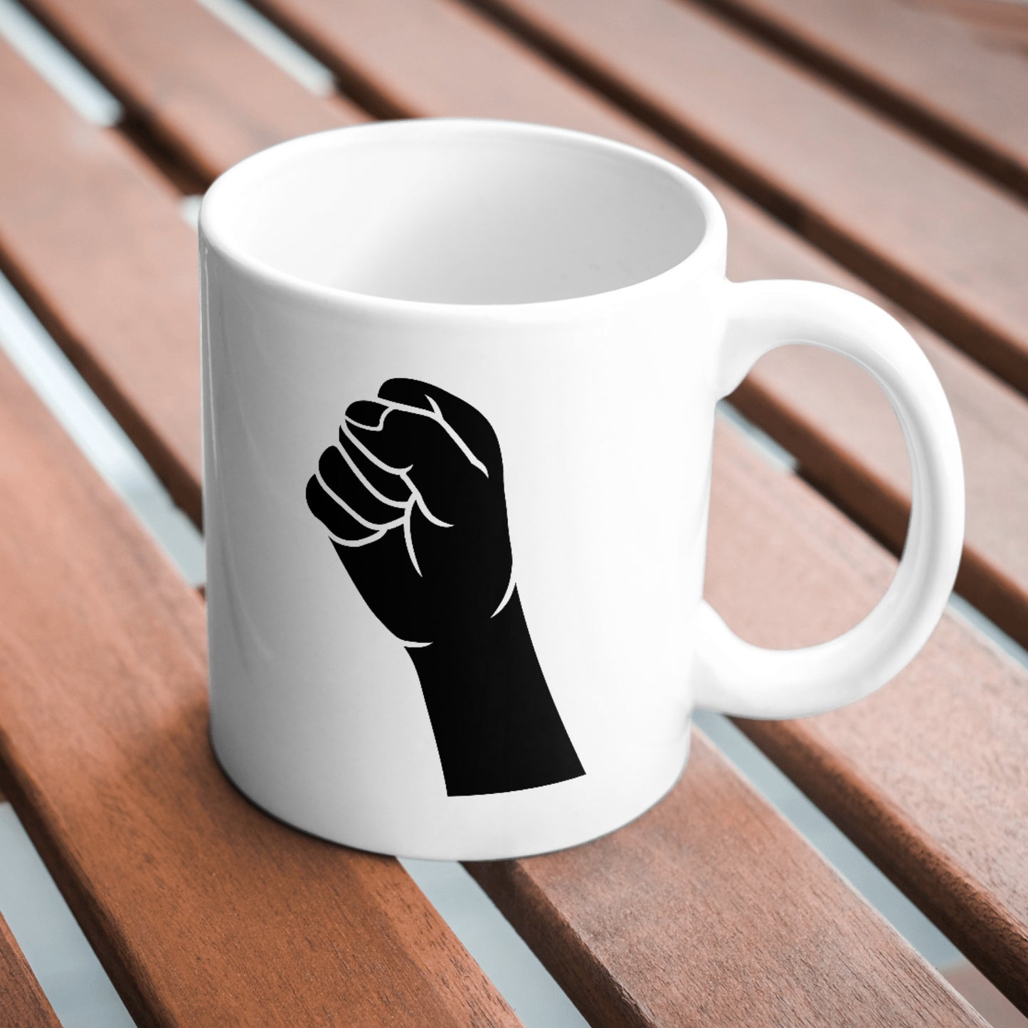 Bold raised fist design for creative cutting projects