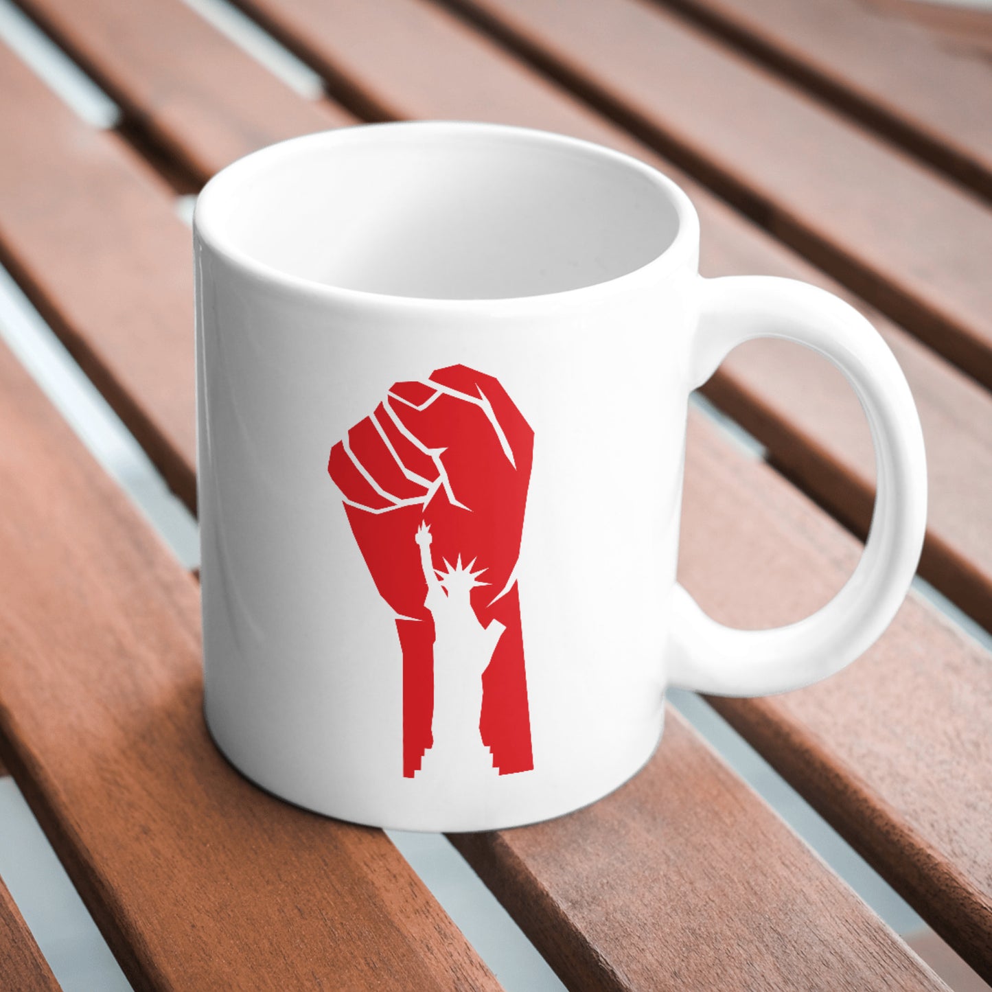 Empowerment symbol featuring a revolution fist and Statue of Liberty