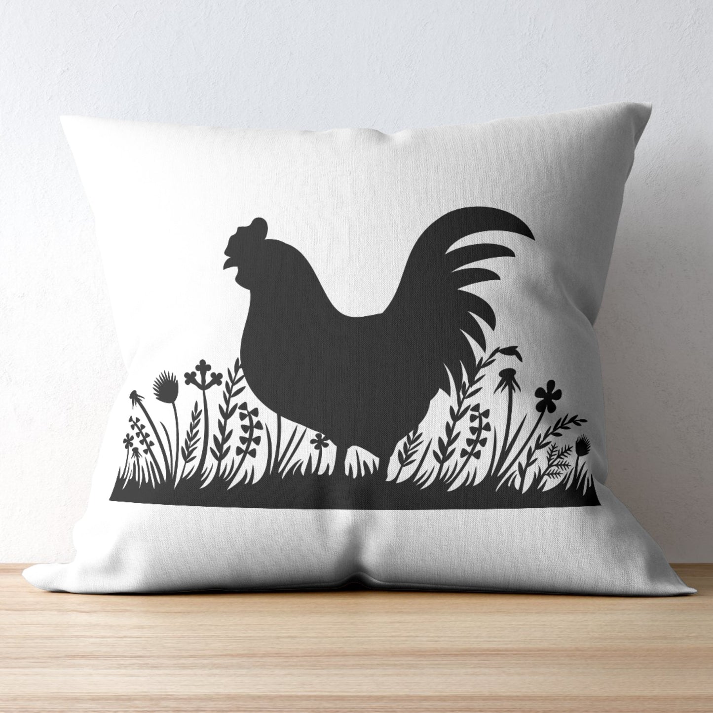 Vector rooster silhouette among flourishing grass and flowers