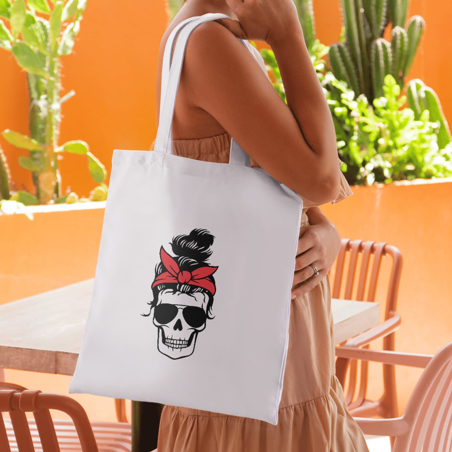 Skull with messy bun and red bandana for creative projects