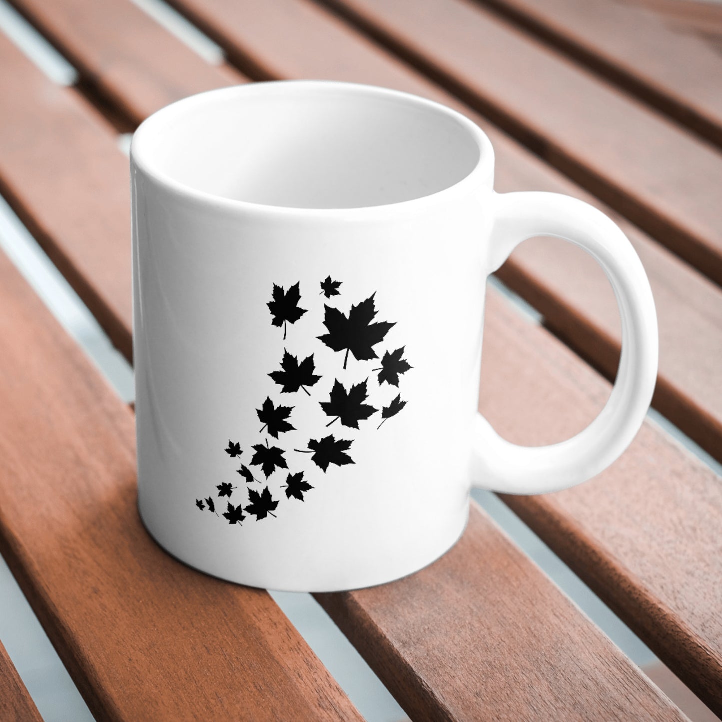Swirling maple leaves in a graceful autumn dance