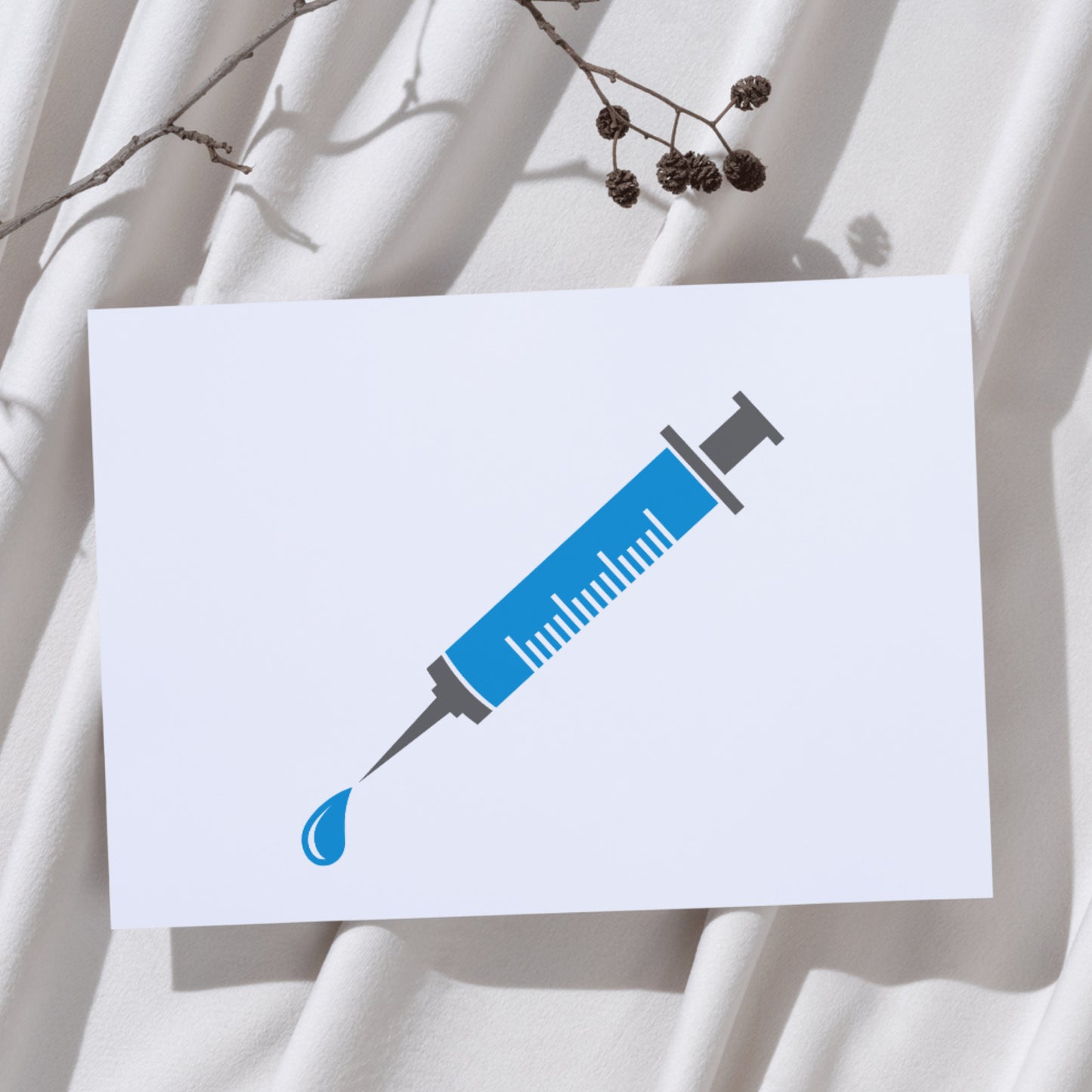 Creative vector design of a syringe with blue liquid drop