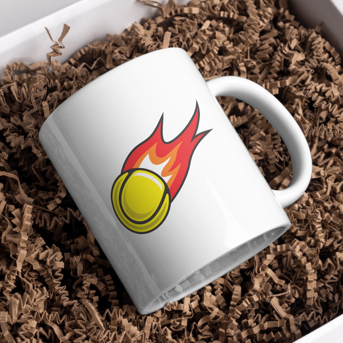 Dynamic tennis ball ignited with vibrant flames
