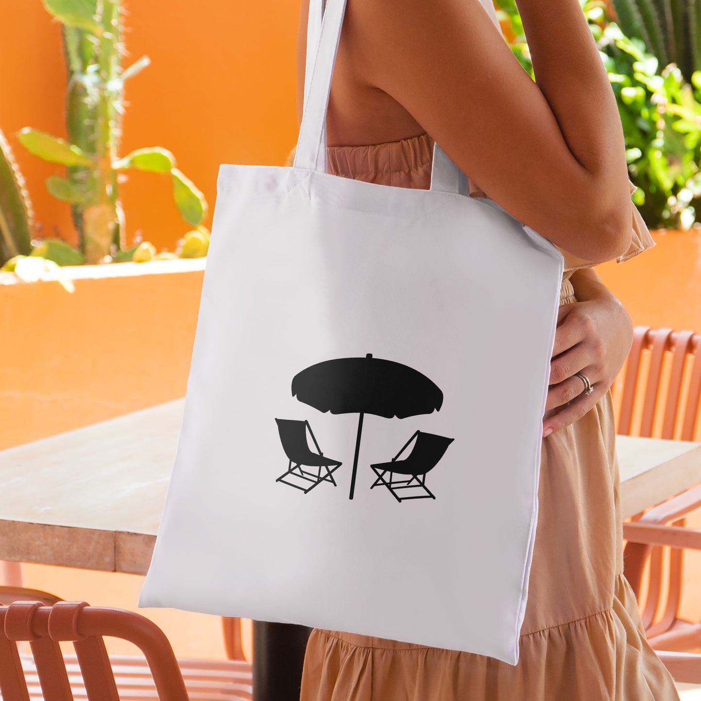 Relax under a shaded umbrella with beach chairs for fun