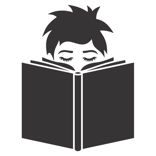 Young boy engrossed in a book, enjoying a quiet moment