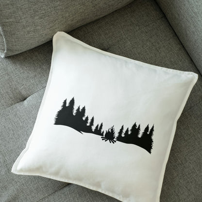 Explore the tranquility of camping under tall trees at sunset