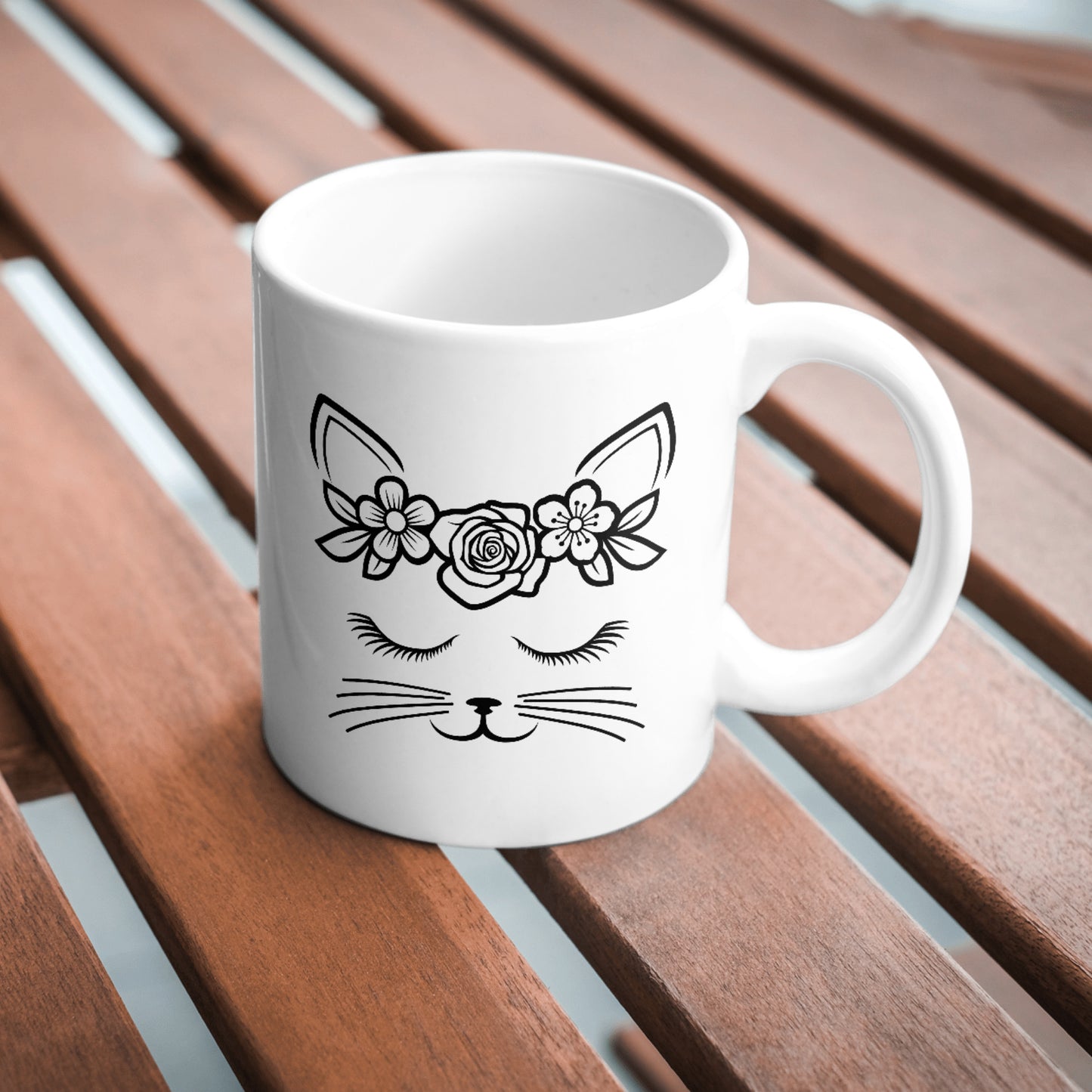 Charming black and white cat design with floral accents