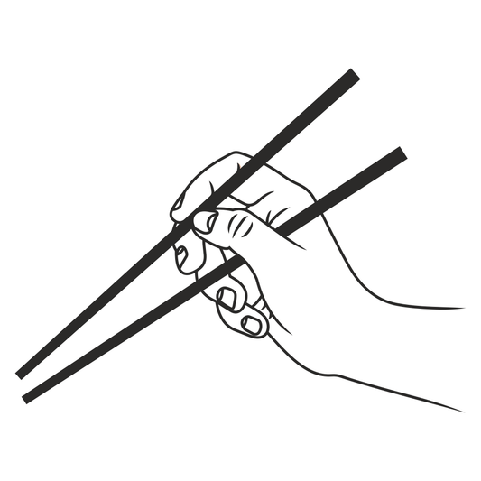 Elegant hand grasping chopsticks for culinary delight