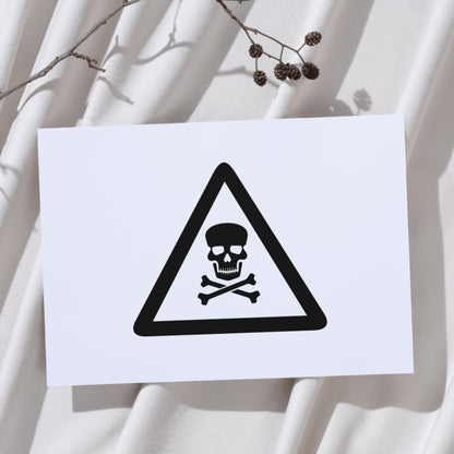 Skull and crossbones danger sign for cutting machine design