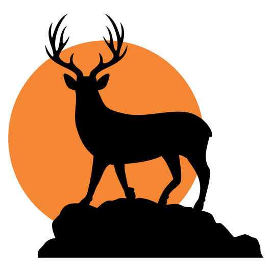 Majestic black deer silhouette with orange sunset backdrop
