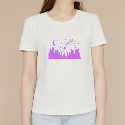 Falling star over a tranquil night landscape with trees