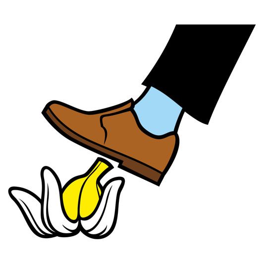 Man humorously slipping on a banana peel while walking