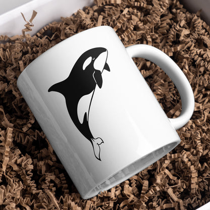 Design with a playful black and white orca shape