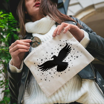 Majestic black eagle soaring among twinkling stars in vector art