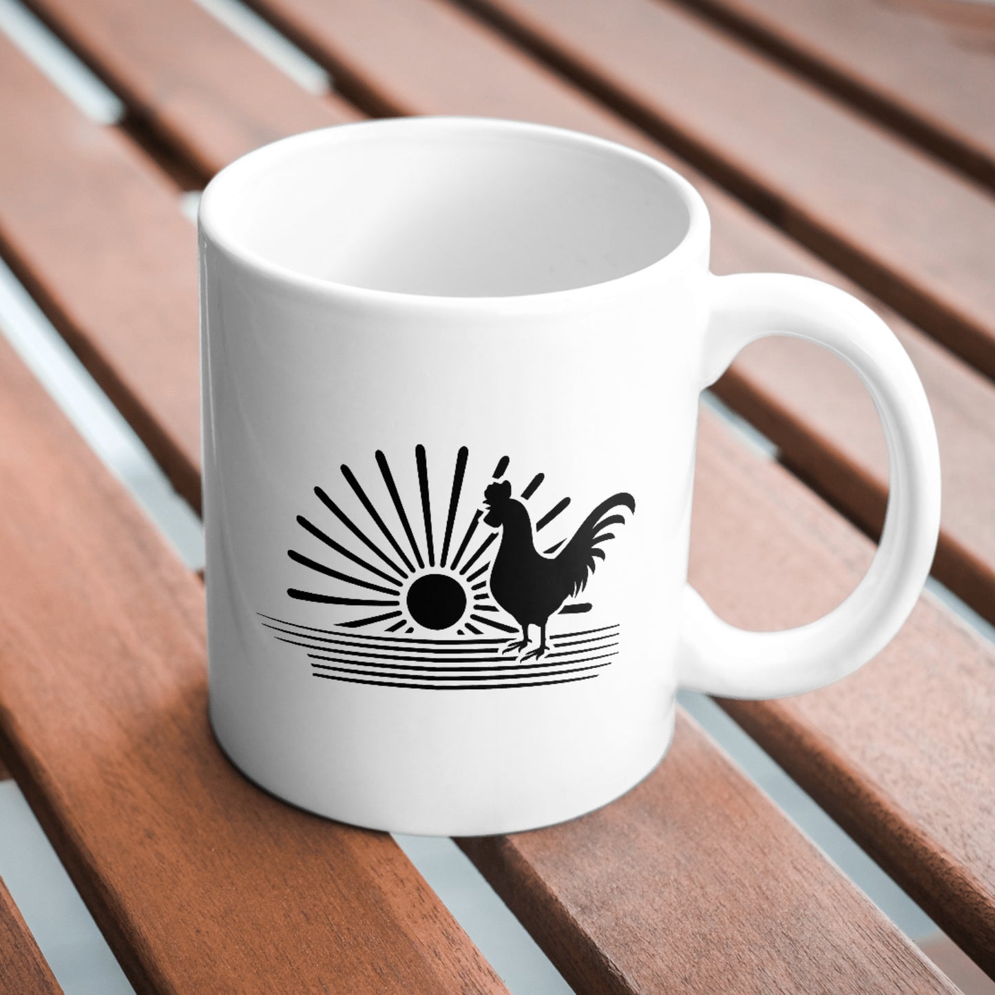 Rooster silhouette with sun rising over peaceful landscape