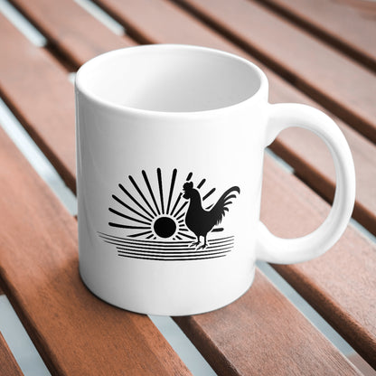 Rooster silhouette with sun rising over peaceful landscape