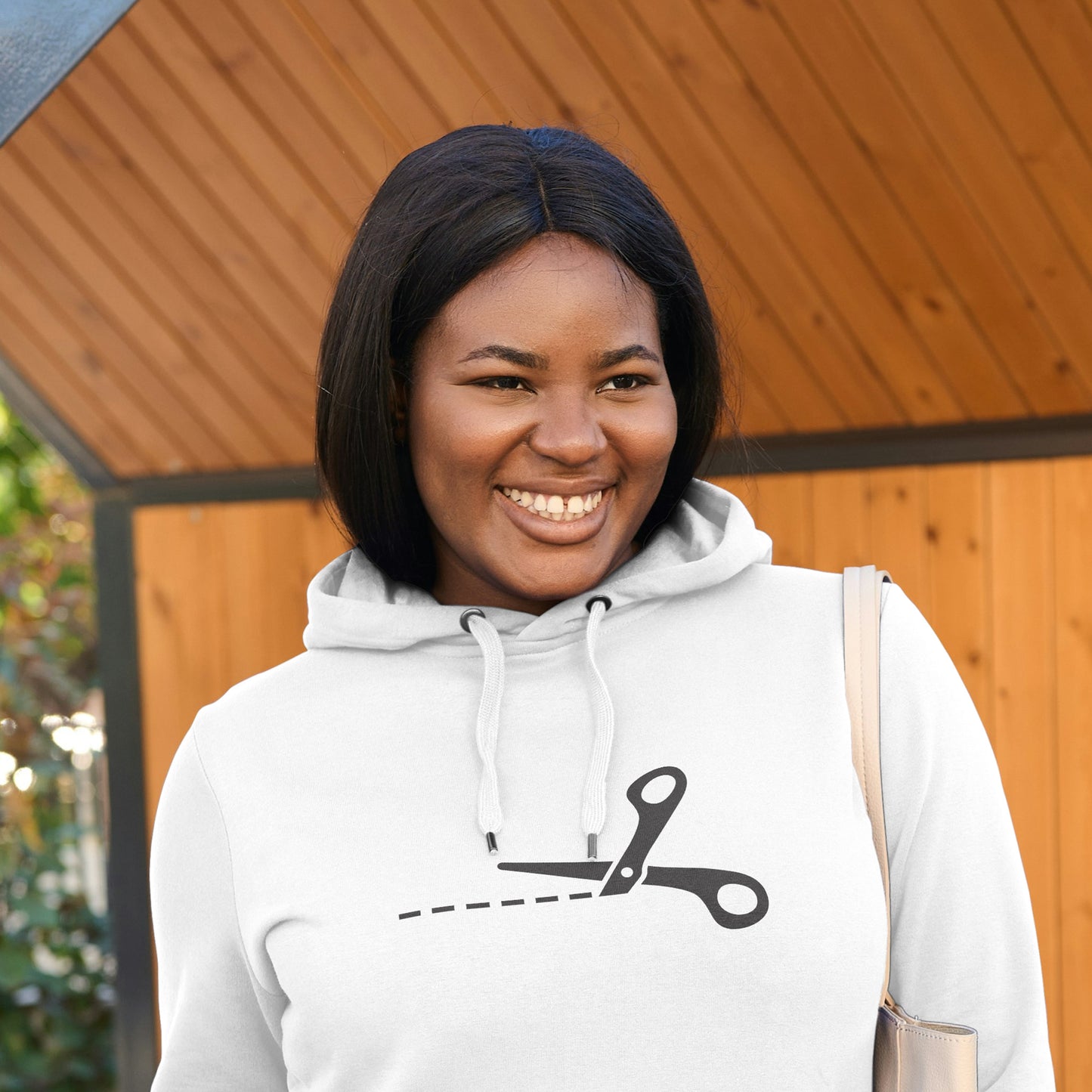 Scissors cutting through dotted line for crafting projects