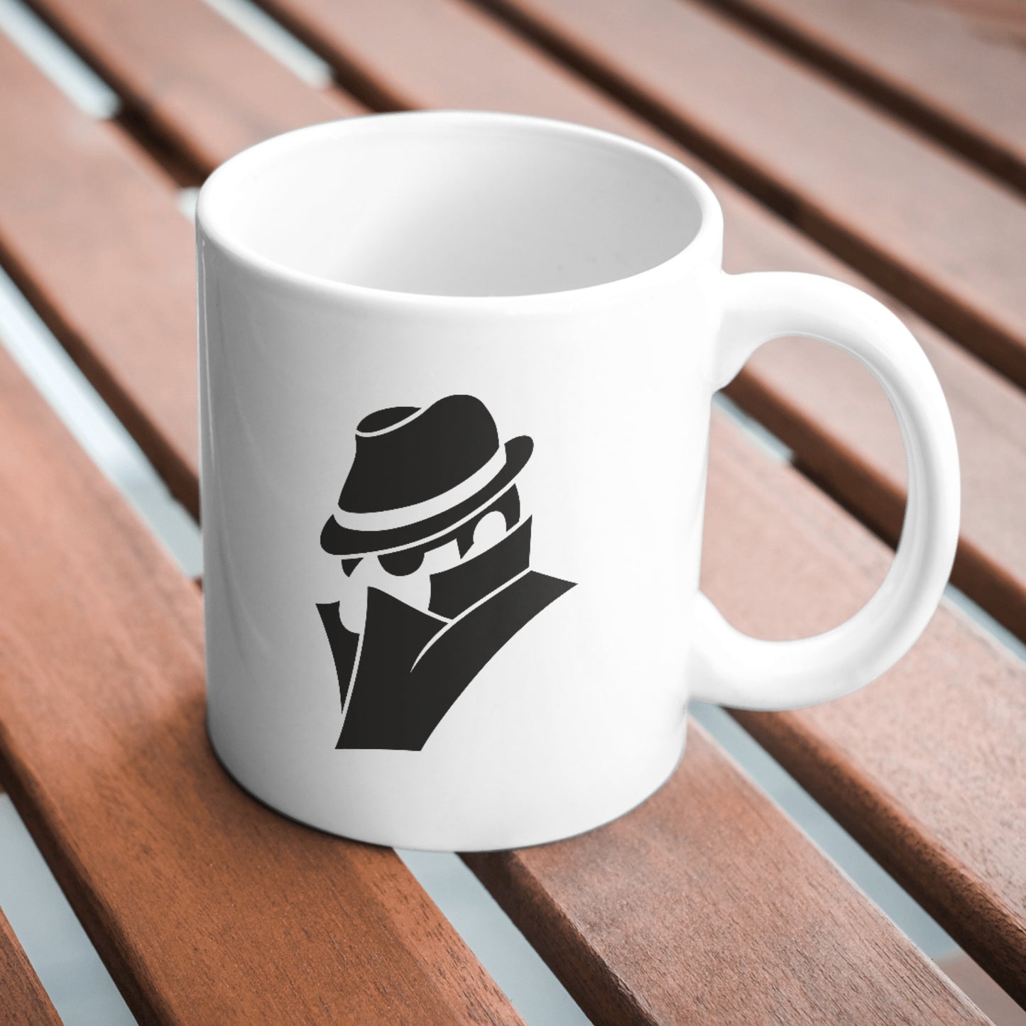 Silhouette of a mysterious figure in a fedora hat