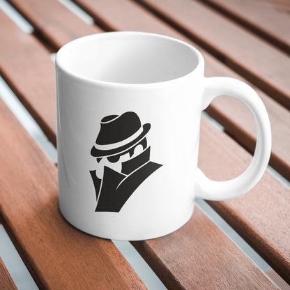 Silhouette of a mysterious figure in a fedora hat