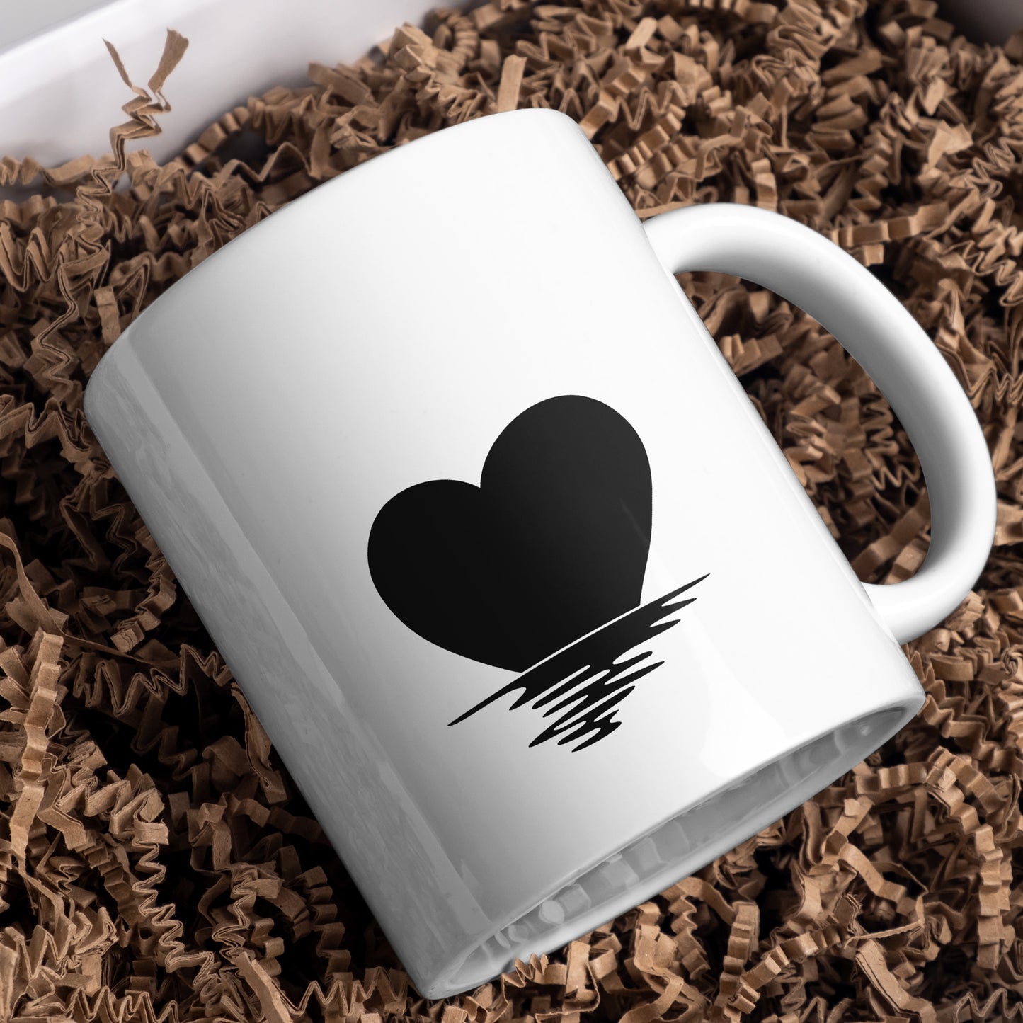 Sunset heart silhouette with reflection in tranquil waters