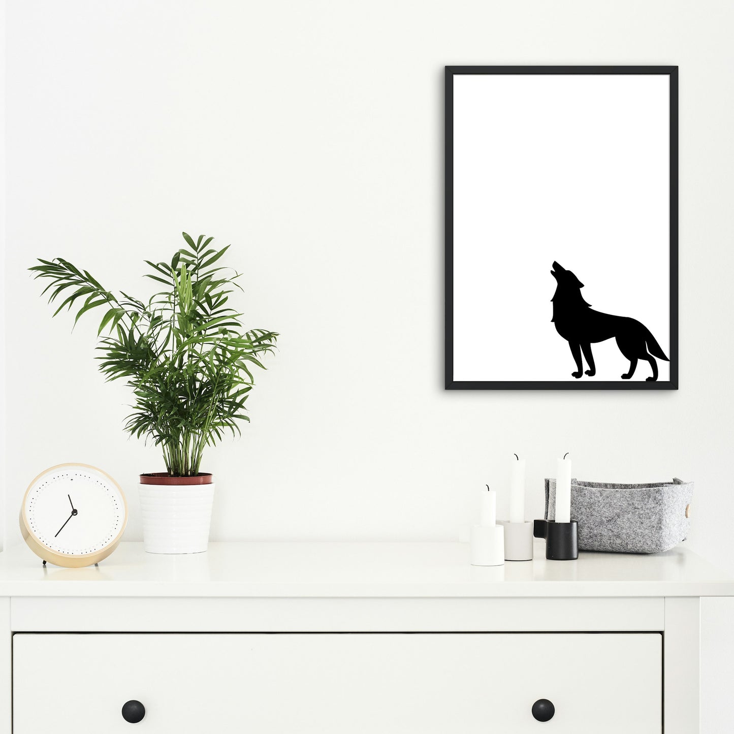Wild wolf silhouette howling at the moon in vector format