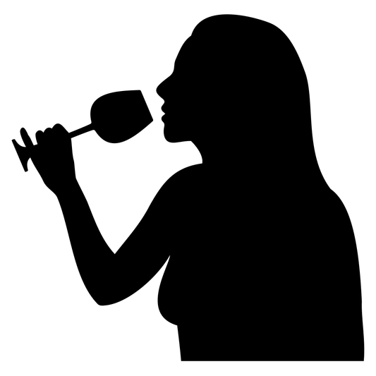 Elegant woman savoring a wine glass in a tranquil moment
