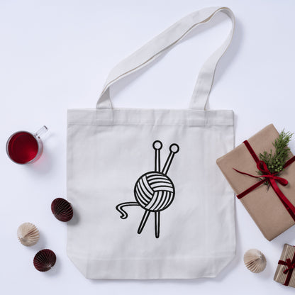 Unique yarn ball design with knitting needles for crafts